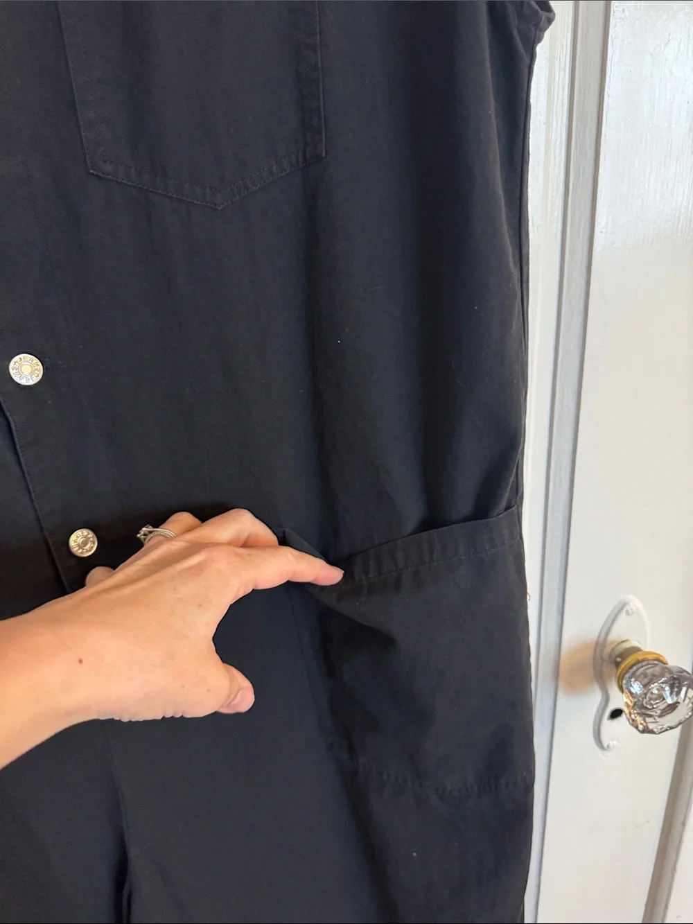 Sleeveless Black Jumpsuit with Front Buttons and utility pockets - Picture 6 of 12